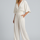 Albína | Jumpsuit su plačiomis kelnėmis ir V formos iškirpte
