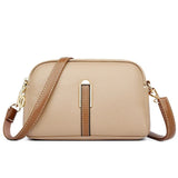 Ši kompaktiška crossbody rankinė idealiai tinka judrioms dienoms
